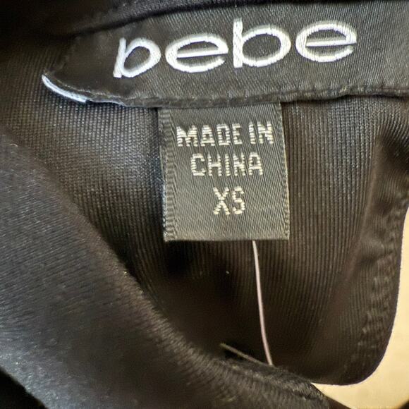 Women's Bebe Black Ruffle Sleeve Keyhole Back Sheath Dress Size XS NEW - Picture 4 of 10